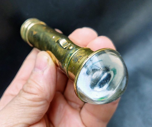 Preview of the first image of A Brass Antique Bulls Eye Torch.