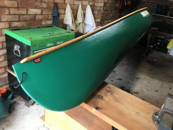 Image 2 of Solo canoe outfitted in ash wood