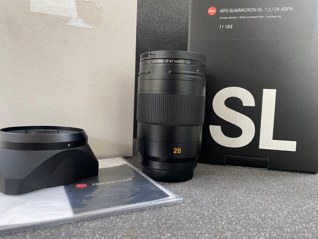 Preview of the first image of Leica 28mm F2 APO SL lens Mint- Boxed.