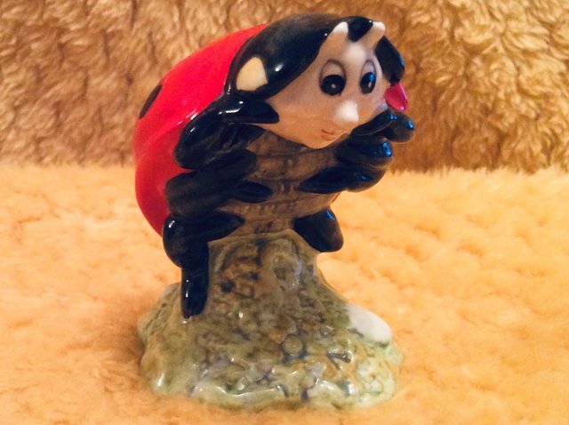Preview of the first image of Beatrix Potter’s Mother Ladybird Figure.