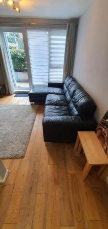 Image 2 of DFS L shaped black leather sofa in good condition