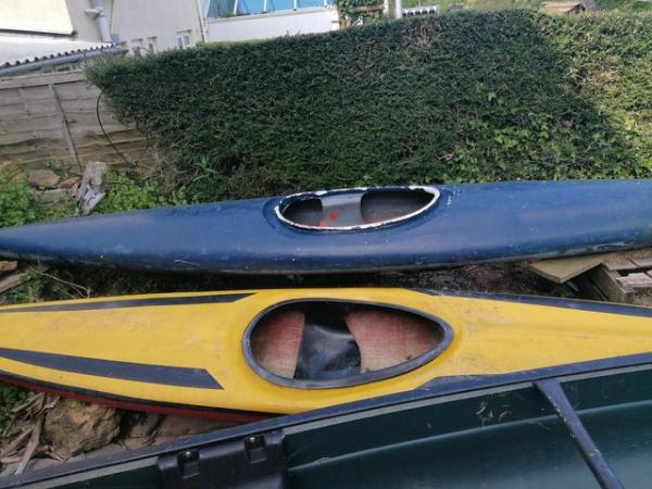 Image 1 of Yellow Perception kayak plus unknown blue kayak