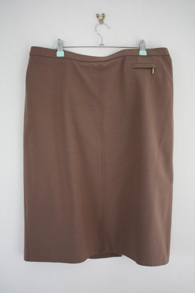 Preview of the first image of Marks & Spencer Women's Light Camel Skirt size 20.