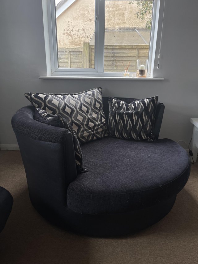 Preview of the first image of DFS Swivel Chair - Charcoal Grey.