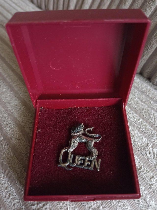 Preview of the first image of Queen silver lion pin badge....