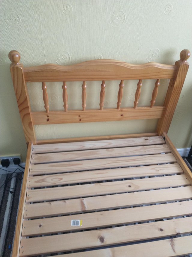 Preview of the first image of Wooden bed frame ,.........