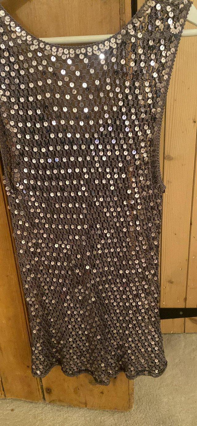 Preview of the first image of Ladies sparkle top size 10/12 £5.