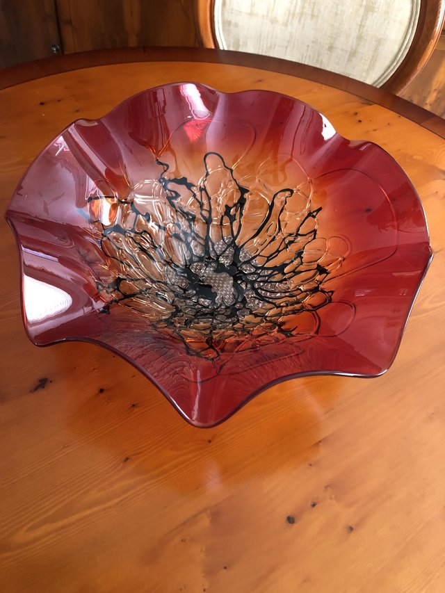 Preview of the first image of Stunning glass red and black bowl.