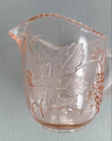 Image 8 of A Small Vintage Glass Jug with Orange Hues.  Height 3.1/2".