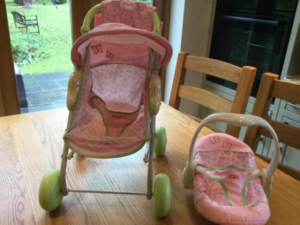 Image 1 of Fisher Price dolls buggy, car seat and changing bag