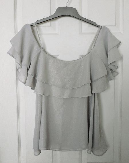 Preview of the first image of Ladies Grey Off The Shoulder Top By Atmosphere - Size 14.