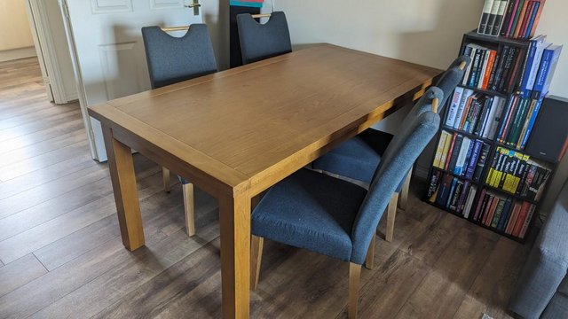 Image 2 of Solid Wood Dining Table and Four Fabric Chairs