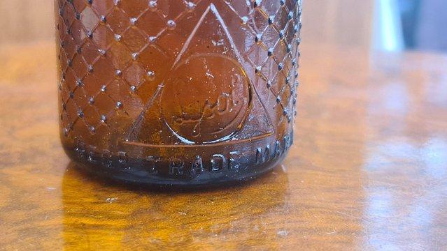 Image 2 of Antique 1920s embossed Lysol bottle amber glass