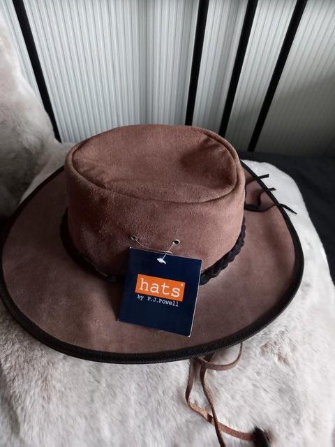 Preview of the first image of Mens tan  hat by PJ Powell.