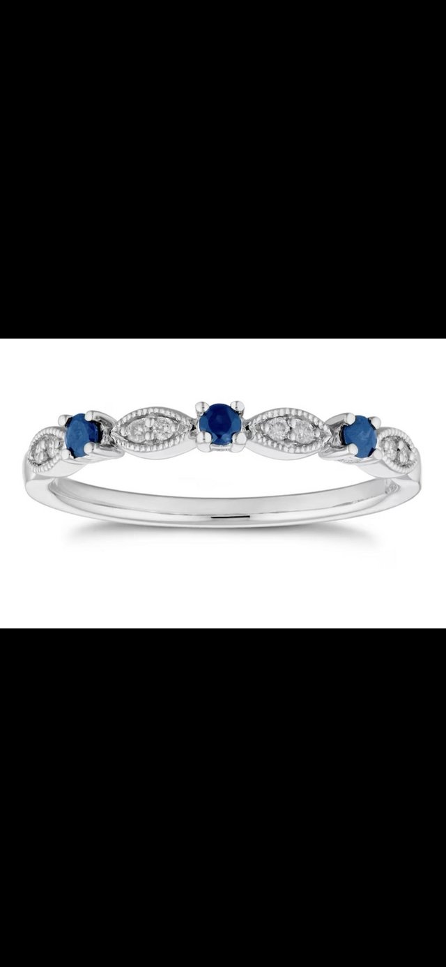 Preview of the first image of Beautiful white gold, sapphire and diamond eternity ring.