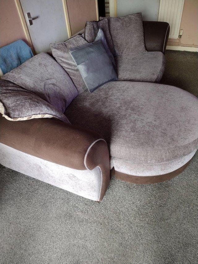 Preview of the first image of Selling a lovely grey sofa.....