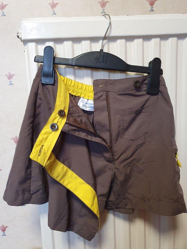 Preview of the first image of Girls Brownie uniform brown skort.