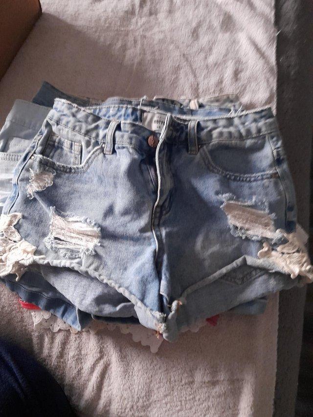 Preview of the first image of 14 Pairs Of Womens Shorts For Sale.