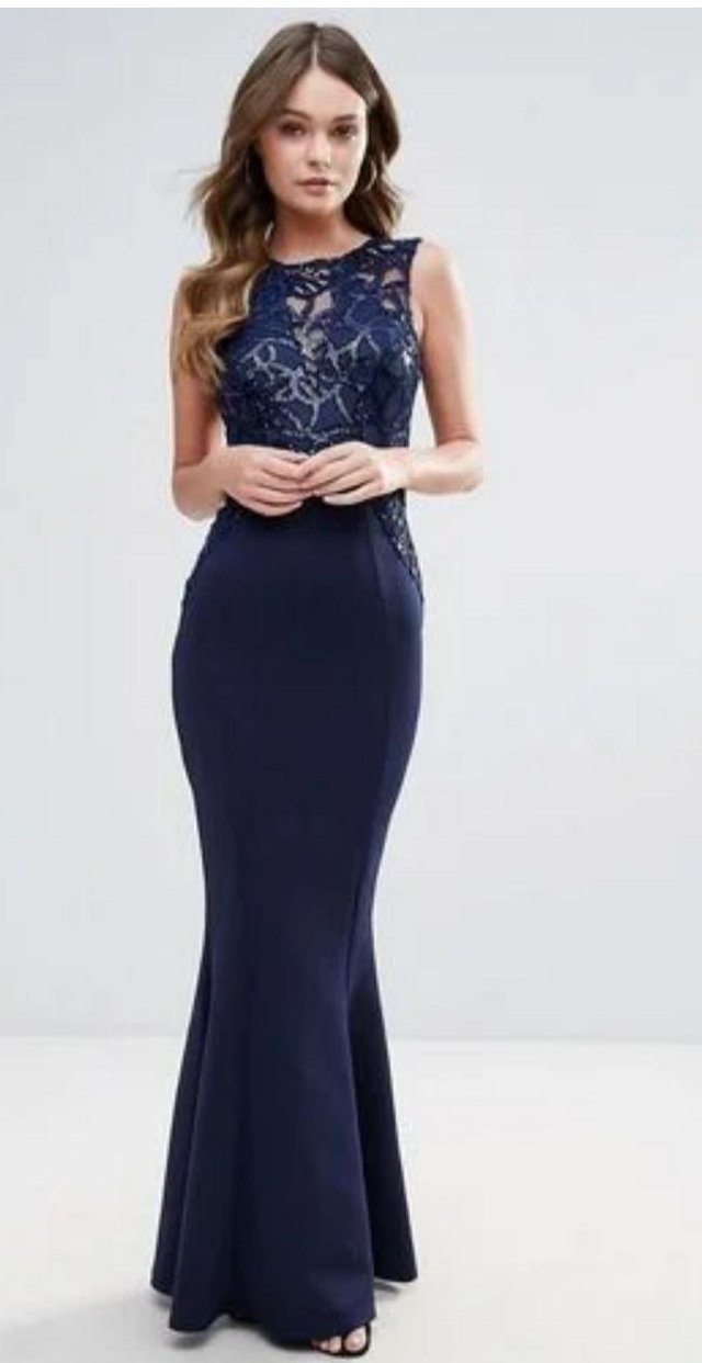 Preview of the first image of Prom dress navy blue with lace and side split size 6-8.