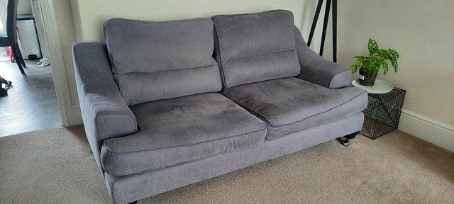 Preview of the first image of Second hand Two seater sofa (grey) £50.