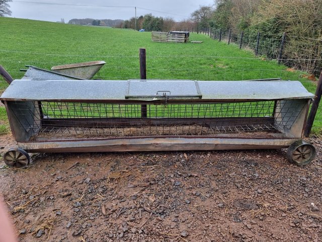 Preview of the first image of 10ft hay feeder rack on wheels.