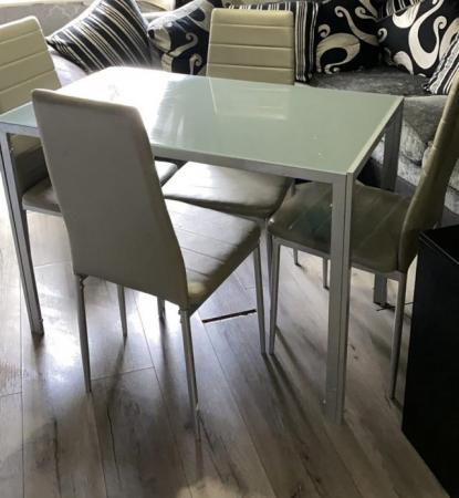 Image 1 of grey glass table and chairs
