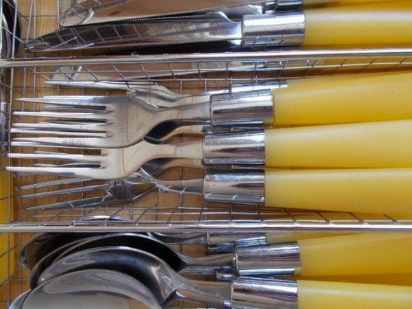 Image 2 of Tray of yellow, plastic handled cutlery