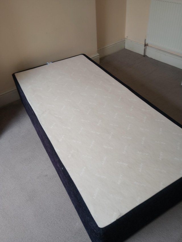 Preview of the first image of Single bed ,mattress, base and protective sheet.