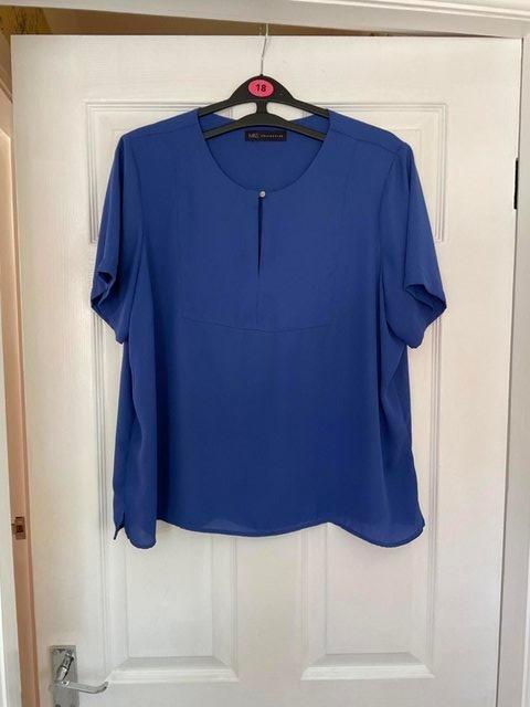 Preview of the first image of M&S Blue blouse size 18 short sleeve.