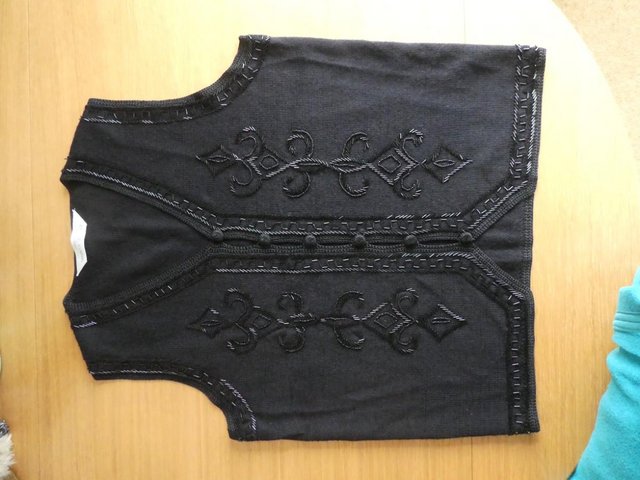 Preview of the first image of Black sequinned waistcoat.