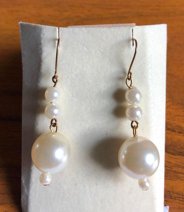 Preview of the first image of NEW  PEARL EFFECT DROP EARRINGS.
