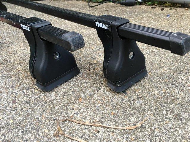 Preview of the first image of Powder-coasted Roof Bar Thule 4304 with lock & mounting kit.