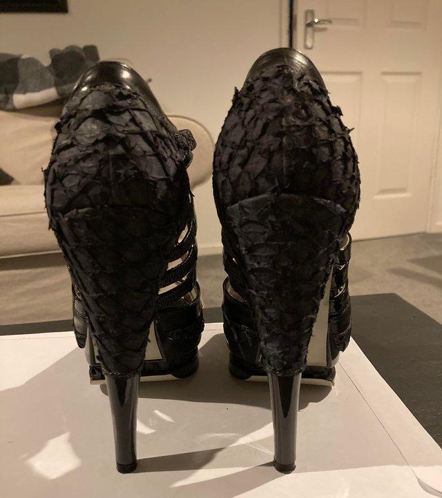Preview of the first image of Size 4 Jason Wu black high heel shoes.