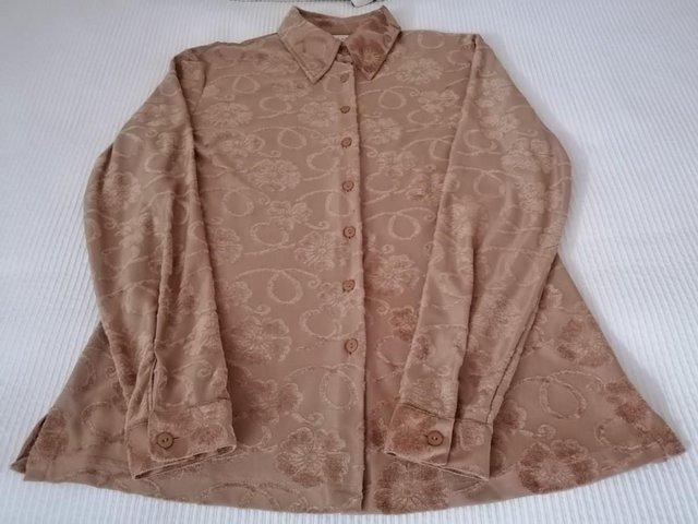 Preview of the first image of LADIES FLOWER PATTERN SHIRT 12 UK.
