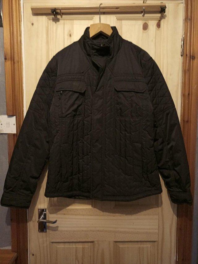 Preview of the first image of MENS QUILTED  LESURE JACKET IN GOOD CONDITION FROM A CL.