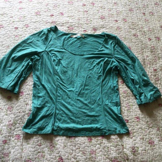 Preview of the first image of Size M STUDIO Light Green Panelled Top, Elbow Length Sleeves.