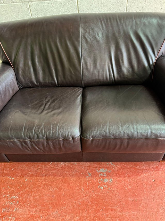 Preview of the first image of 2 seat black leather sofa.