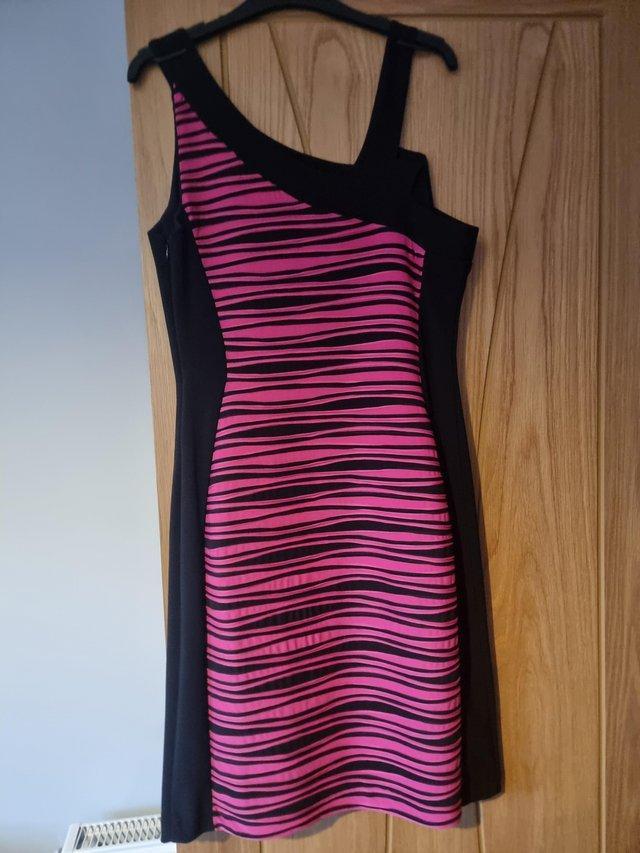 Preview of the first image of Joseph Ribkoff Black and Pink Striped Dress. Size 12.