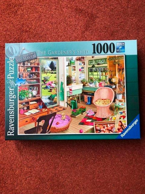 Preview of the first image of RAVENSBURGER 1000 PIECE JIGSAW PUZZLE-THE GARDENERS SHED.