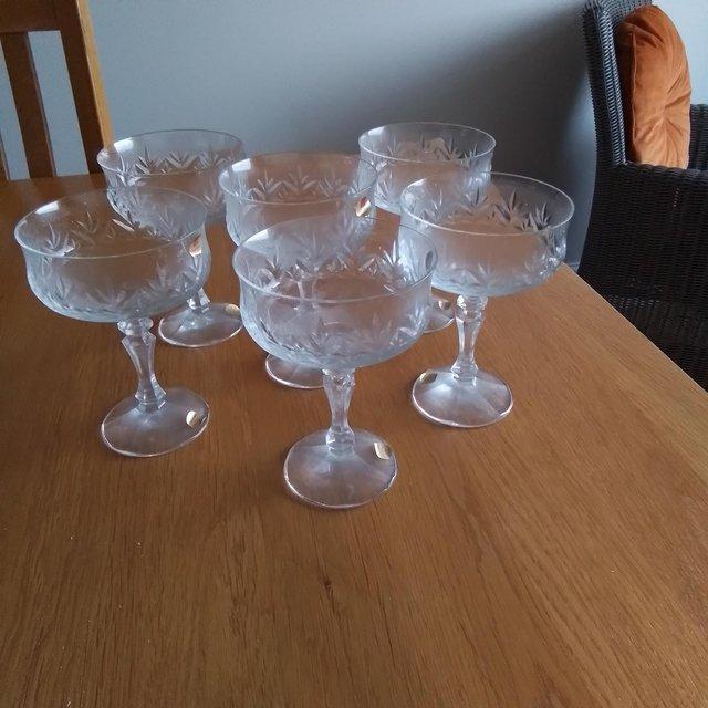 Preview of the first image of Six Lead Crystal Champagne Glasses.