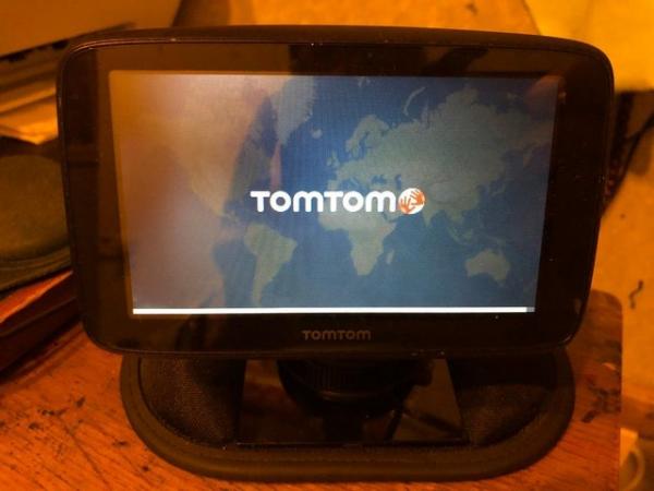 Image 1 of TomTom Sat Nav with solid stand