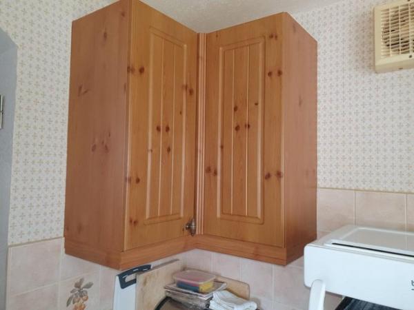 Image 1 of Several kitchen cupboards with doors and hinges
