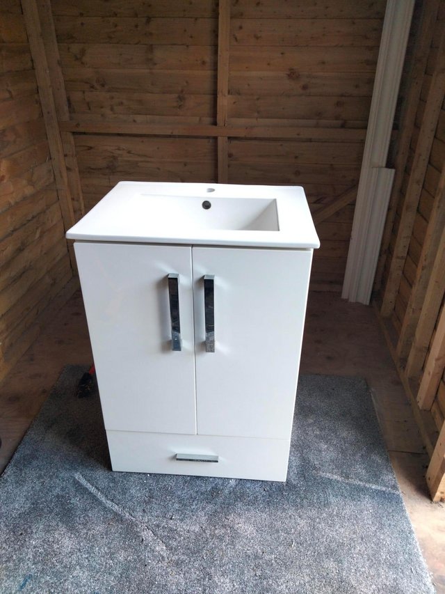 Preview of the first image of Free standing white bathroom vanity unit & ceramic sink.