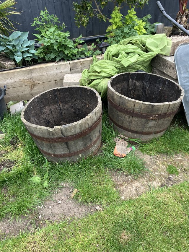 Preview of the first image of Two half wooden barrels.