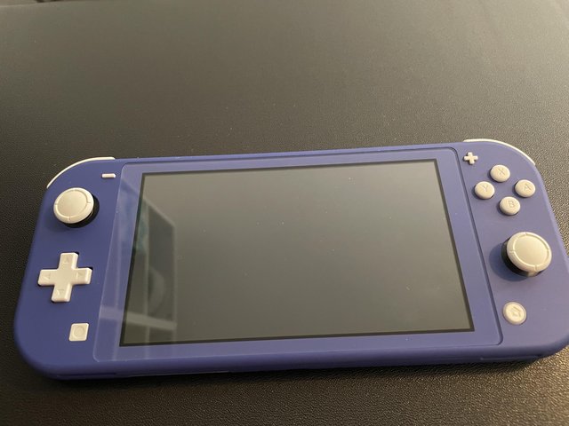 Preview of the first image of Nintendo seitch lite 32GB brand new.