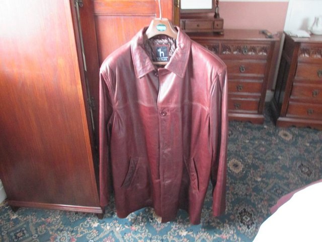 Preview of the first image of mens brown leather jacket.