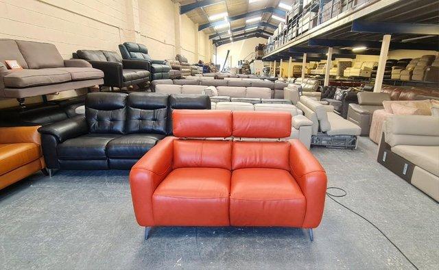 Preview of the first image of La-z-boy Washington orange leather recliner 2 seater sofa.