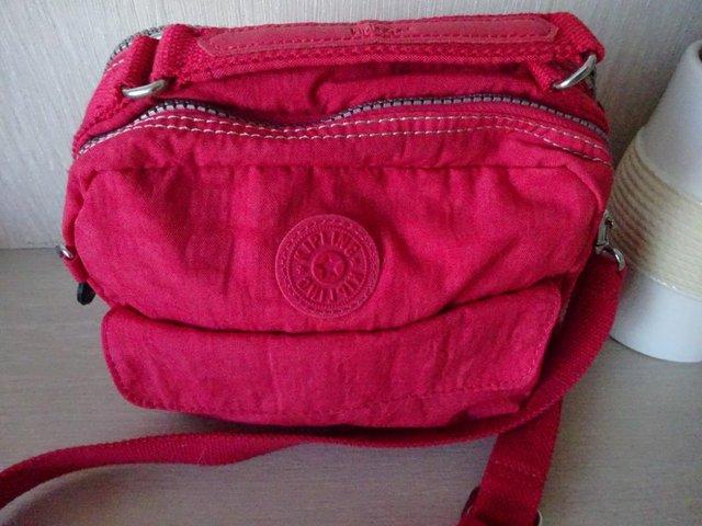 Preview of the first image of KIPLING BRIGHT PINK SHOULDER/ACROSS BODY ZIPPED BAG.