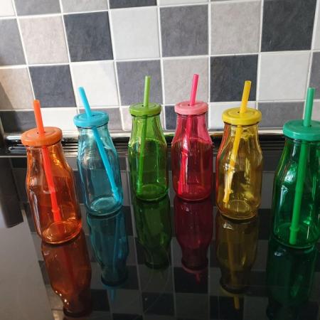 Image 1 of Set of six coloured glass drinking bottles with straw