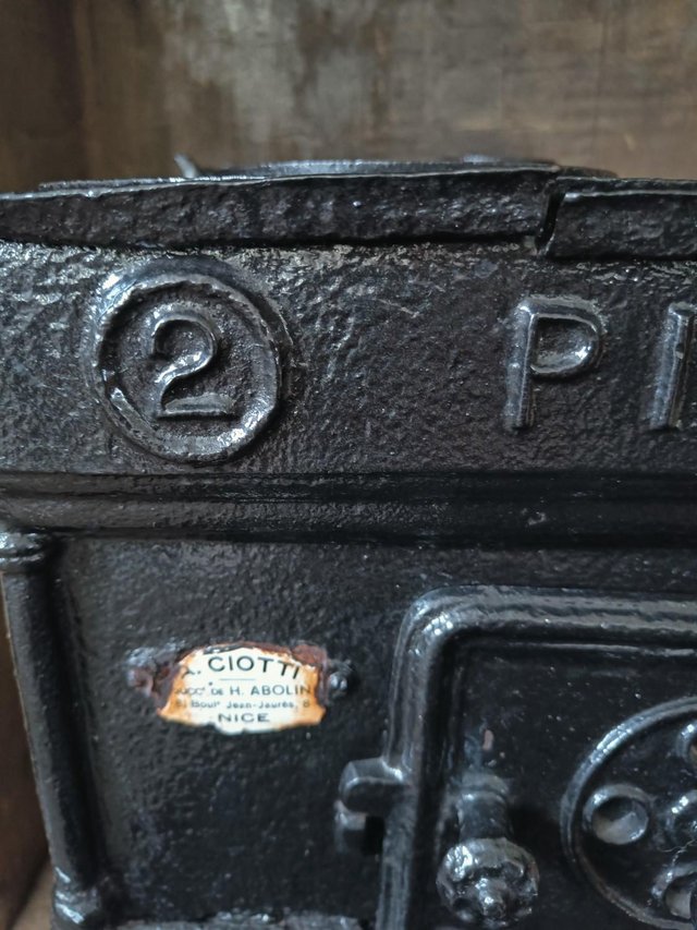 Preview of the first image of Antique cast iron stove PIMAR made in Nice, France Black ham.